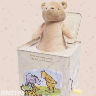 'Some moments were made for remembering.' A classic Winnie the Pooh jack-in-the-box toy featuring Pooh bear, Eeyore and Tigger.