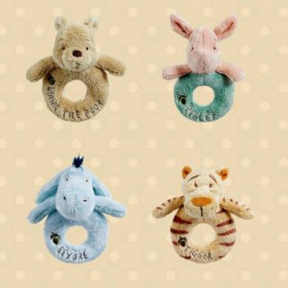 Baby soft plush face of Winnie the Pooh bear, Piglet, Eeyore donkey and Tigger on a classic plush ring with jingle rattle.